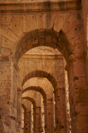 The arches of the roman amphitheater of El Djem in Tunisiaの写真素材