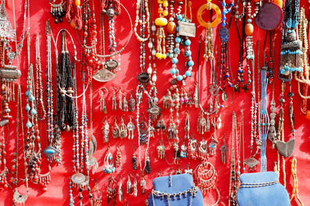 Colorful handmade jewelery on sale in a Tunisian bazaarの写真素材