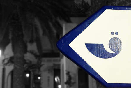 Blue arabic sign in the village of Port el Kantaoui in Tunisiaの写真素材