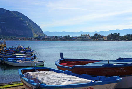 Mondello coastview in Sicily with boats and Pellegrino Mountの写真素材