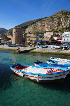 Moored fishing boats on the crystalline sea of Sicilyのeditorial素材