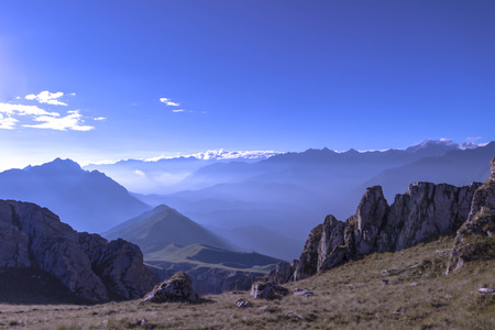arly morning sunrise and a beautiful lights in the mountainsの写真素材