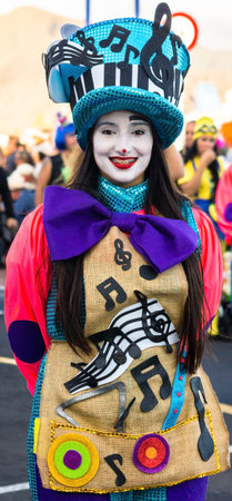 Tenerife, Spain - 09-02-2016: Tenerife Carnival - Young girl disguised as the mad hatterのeditorial素材