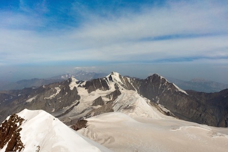 Caucasian mountains and clouds. glacier. landscape blue sky
