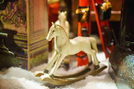 decorative toy horse in snow. clouse upの写真素材