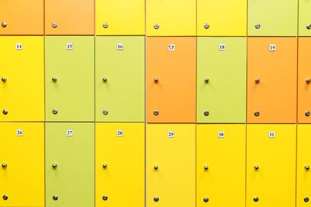 colorful children's lockers in the locker room of the nurseryの写真素材