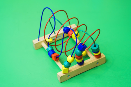 childrens abacus on the floor. isolated on background. Scoresの写真素材
