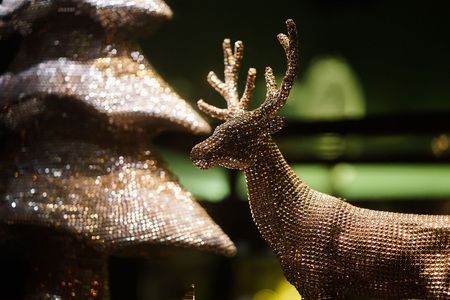 decorative gold toy Christmas deer. clouse upの写真素材