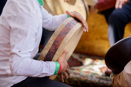 A man plays the tambourineの写真素材