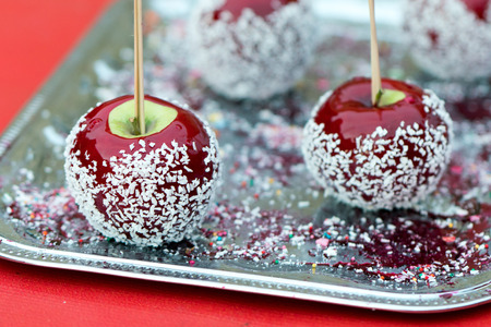 Beautiful of sweet red apples in caramel sugar exposed for saleの写真素材
