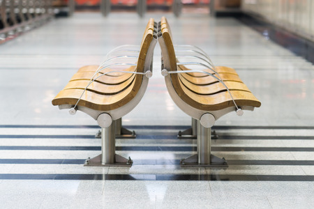 Waiting area at train station. Empty chairs in rest areaの写真素材