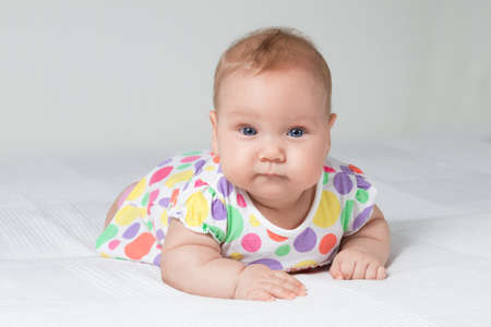 baby in polka-dotted dressの写真素材