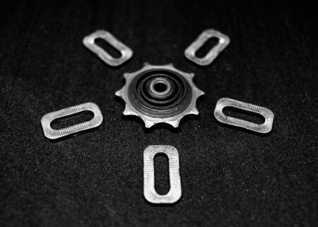 Gear and details on a black backgroundの写真素材