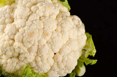 Cauliflower on the black backgroundの写真素材