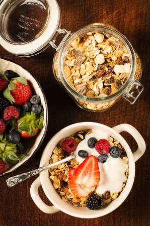 Healthy breakfast with muesli, berries and yoghurt