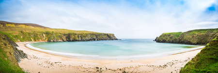 Panorama beach sea view in Ireland ocean coast. Atlantic cliffs and rocks. Beautiful landscape nature.の写真素材
