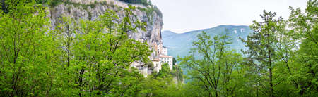 Place of pilgrimage Madonna della Corona with church on the hill above the Adige. Beautiful...