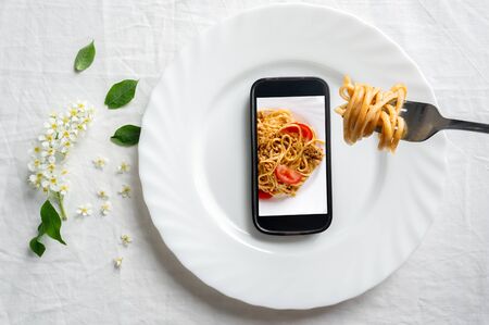 Pasta bolognese. Optical illusion. From Virtual to reality