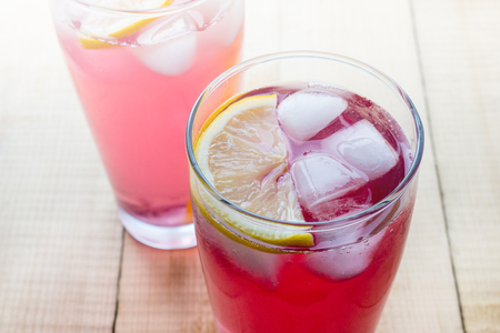 Cool summer drink. Fruit-drink with iceの写真素材