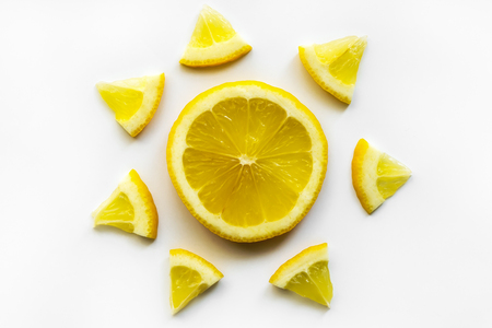 Sliced ripe lemon. Sun shaped.の写真素材