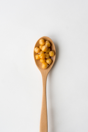 Chickpea on wooden spoonの写真素材