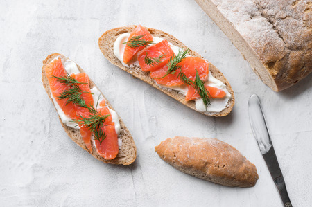 Homemade toast with smoked salmon.の写真素材