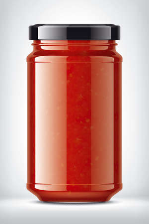 Glass Jar with Tomato Sauce on Background.の写真素材
