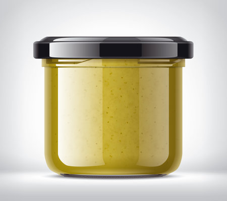 Glass Jar with Mustard on Background.の写真素材