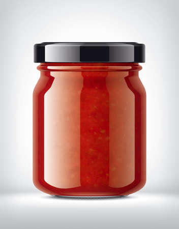 Glass Jar with Tomato Sauce on Background.の写真素材