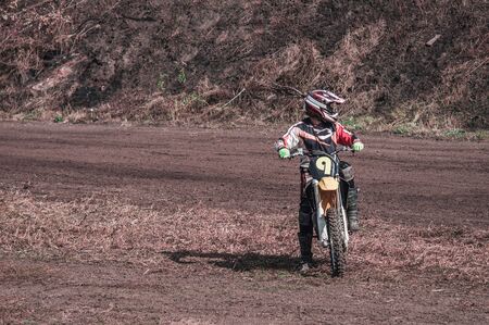 Motocross rider in action. Motocross sport. Close-up photo. Active extreme rest.の写真素材