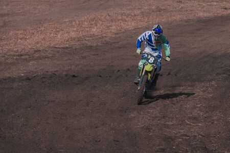 Motocross rider in action. Motocross sport. Close-up photo. Active extreme rest.の写真素材
