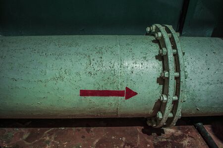 Big green pipe with red pointer.の写真素材