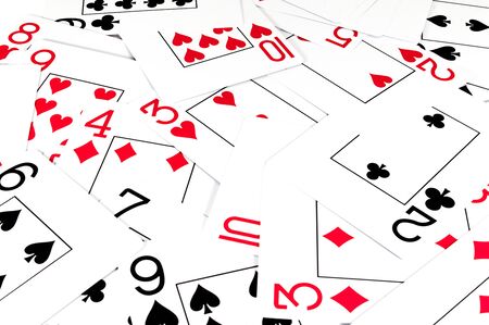 Isolated playing cards on white background. Red and black cardsの写真素材
