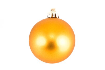 Yellow Christmas ball closeup isolated on white backgroundの写真素材