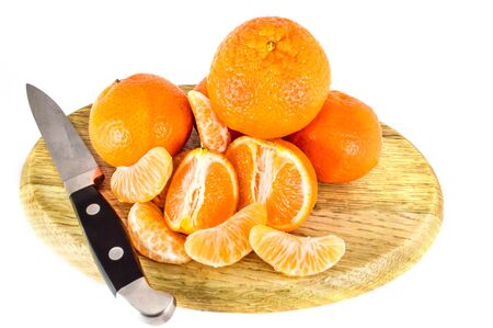 Orange mandarins,  tangerine peel or mandarin slice isolated on white background. Closeup photos of fresh citrus fruit.の写真素材