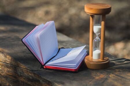 Notebook with the inscription CORONAVIRUS on the benchConcept photo on theme Coronavirus and...