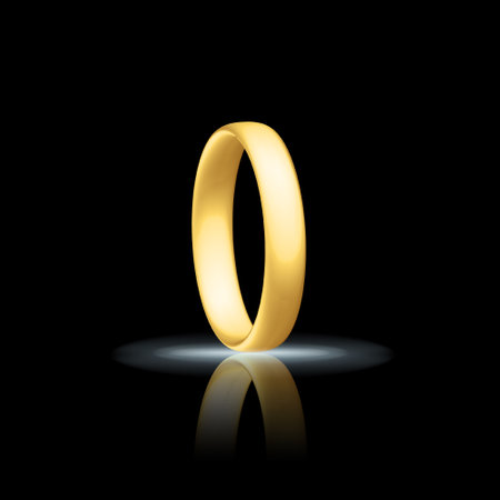 Golden realistic wedding ring with reflection. Anniversary romantic surprise. golden jewelry objectの写真素材