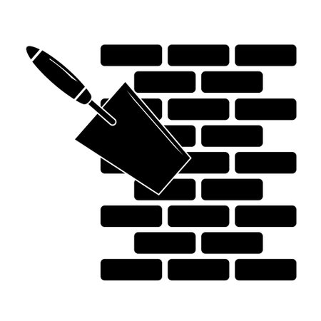 Brick wall and trowel icon in trendy design style. flat styleのイラスト素材