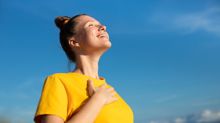 Happy joyful positive girl, young beautiful feeling carefree woman is enjoying vacation at summer...