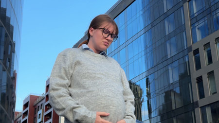 woman worries about pregnancy, concept work, maternity leaveの写真素材