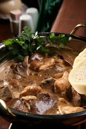 Cooked mushrooms with white breadの写真素材