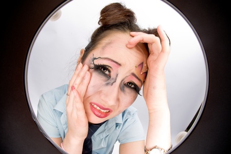 Closeup of young stressed asian womanの写真素材