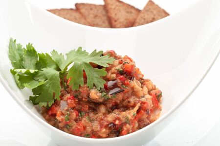 Close up of the caviar made of eggplants and tomatoes. Ukrainian cuisine.の写真素材