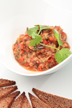 Close up of the caviar made of eggplants and tomatoes. Ukrainian cuisine.の写真素材