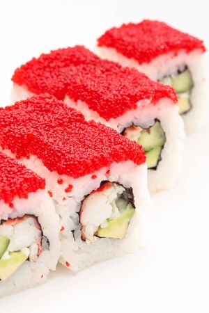 California rolls on a white background with red caviarの写真素材