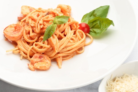 Close-up of linguine pasta with salmon and shrimpsの写真素材