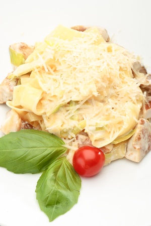 Close-up of papardelle with mushrooms decorated on a white backgroundの写真素材