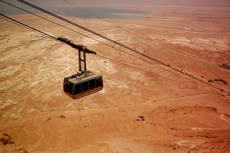 Cable to Masada, Judean Desert, Israel. The Dead Sea is in the background.の写真素材