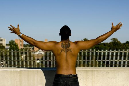 Attractive young African American male playing posing.の写真素材