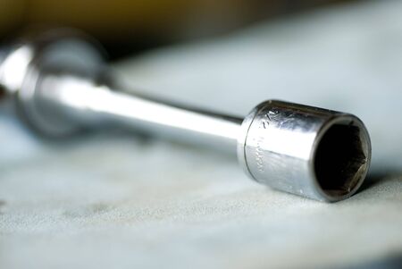 Close-up of open-ended chrome toolの写真素材